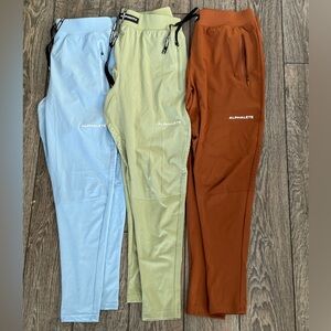 Alphalete Joggers in Light Blue, Olive, and Rust